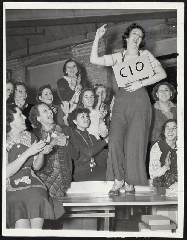 Strikers in the Vesta underwear Company in Providence hailed the truce signed by C.I.O. representatives and company owners.