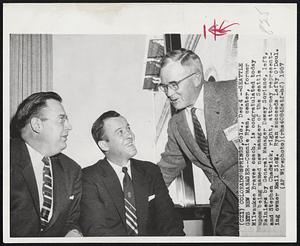Seattle Gets New Manager-- Connie Ryan, center, former Milwaukee Braves coach, is congratulated today upon being named new manager of the Seattle Rainiers by General Manager Dewey Soriano, left, and Stephen Chadwick, right, attorney representing owner Emil Sick, Ryan succeeds Lefty O'Doul.