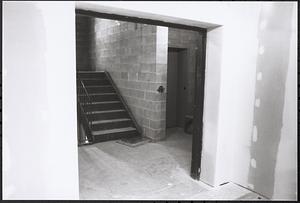 Library addition under construction stairway, with unfinished walls