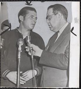 Answers newsmen's questions