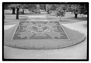 Veterans of Foreign Wars of the United States logo floral design in front of Ether Monument, Public Garden
