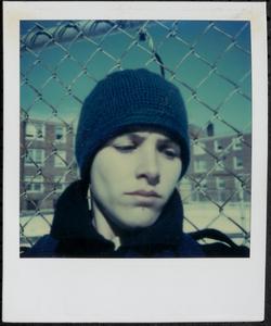 Close-up of a young person wearing winter hat