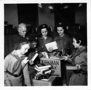 Library and Girls Scouts helping soldiers.