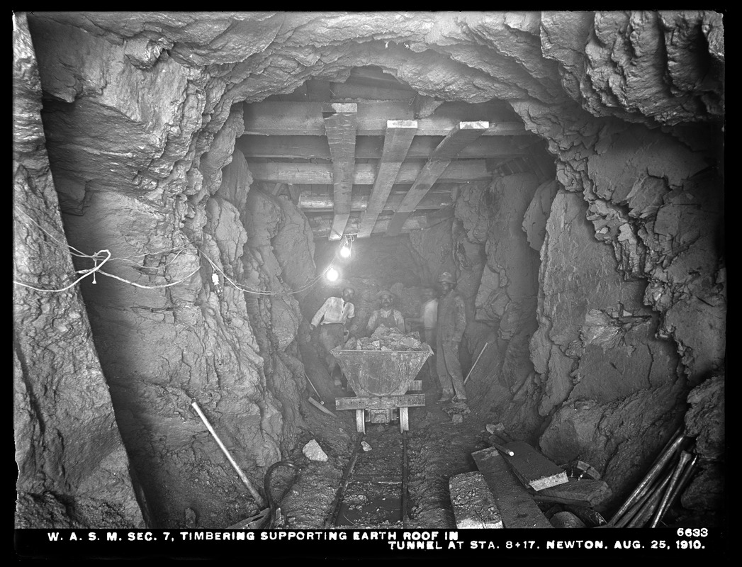 Distribution Department, Weston Aqueduct Supply Mains, Section 7, timbering supporting earth roof in tunnel at station 8+17, Newton, Mass., Aug. 25, 1910