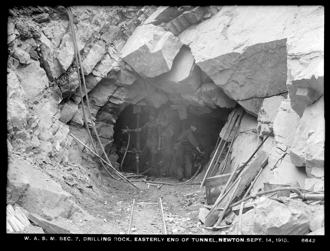 Distribution Department, Weston Aqueduct Supply Mains, Section 7, drilling rock, easterly end of tunnel, Newton, Mass., Sep. 14, 1910