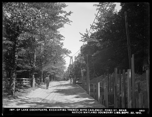 Sudbury Department, improvement of Lake Cochituate, excavating trench with cableway, Pond Street, near Natick-Wayland boundary line, Wayland, Mass., Sep. 22, 1910