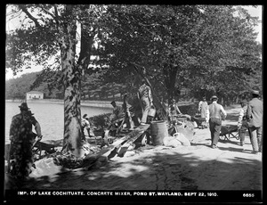 Sudbury Department, improvement of Lake Cochituate, concrete mixer, Pond Street; Gatehouse in background, Wayland, Mass., Sep. 22, 1910