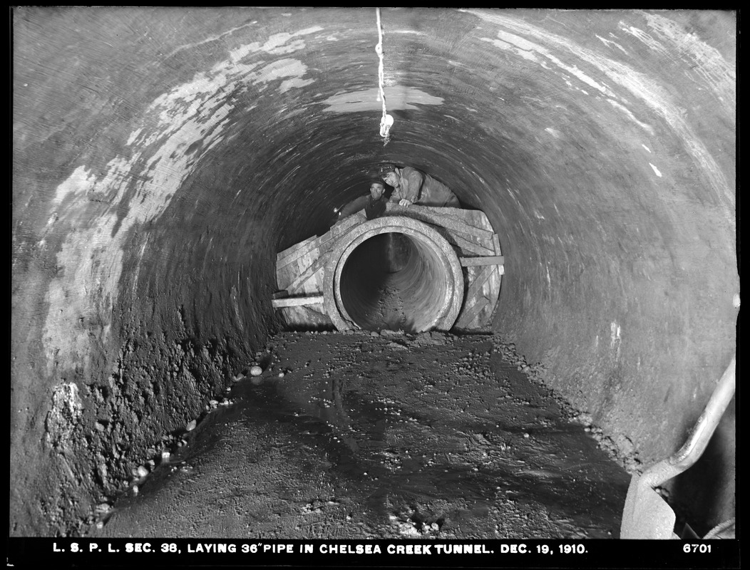 Distribution Department, Low Service Pipe Lines, Section 38, laying 36-inch pipe in Chelsea Creek tunnel, Chelsea; East Boston, Mass., Dec. 19, 1910