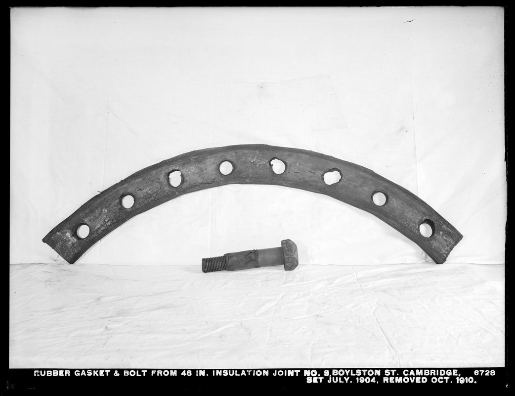 Electrolysis, rubber gasket and bolt, from 48-inch insulation joint No. 3, Boylston Street; set July 1904, removed October 1910, Cambridge, Mass., Dec. 1910