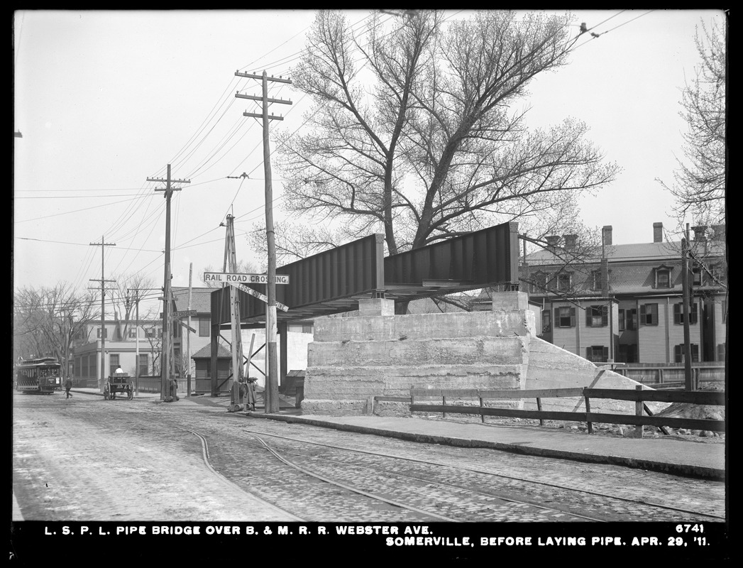 Distribution Department, Low Service Pipe Lines, pipe bridge over Boston & Maine Railroad at Webster Avenue, before laying pipe, Somerville, Mass., Apr. 29, 1911