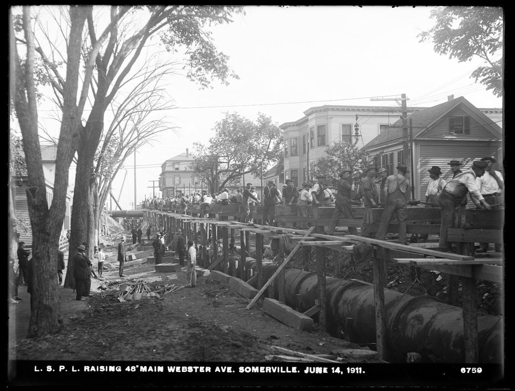 Distribution Department, Low Service Pipe Lines, raising 48-inch main Webster Avenue, Somerville, Mass., Jun. 14, 1911