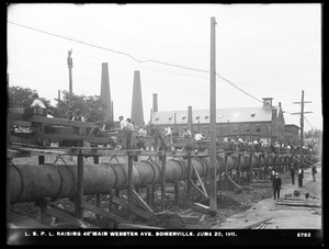 Distribution Department, Low Service Pipe Lines, raising 48-inch main, Webster Avenue, Somerville, Mass., Jun. 20, 1911