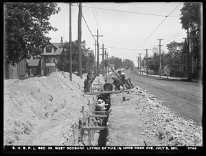 Distribution Department, Southern High Service Pipe Lines, Section 39, laying 24-inch pipe in Hyde Park Avenue, West Roxbury, Mass., Jul. 8, 1911