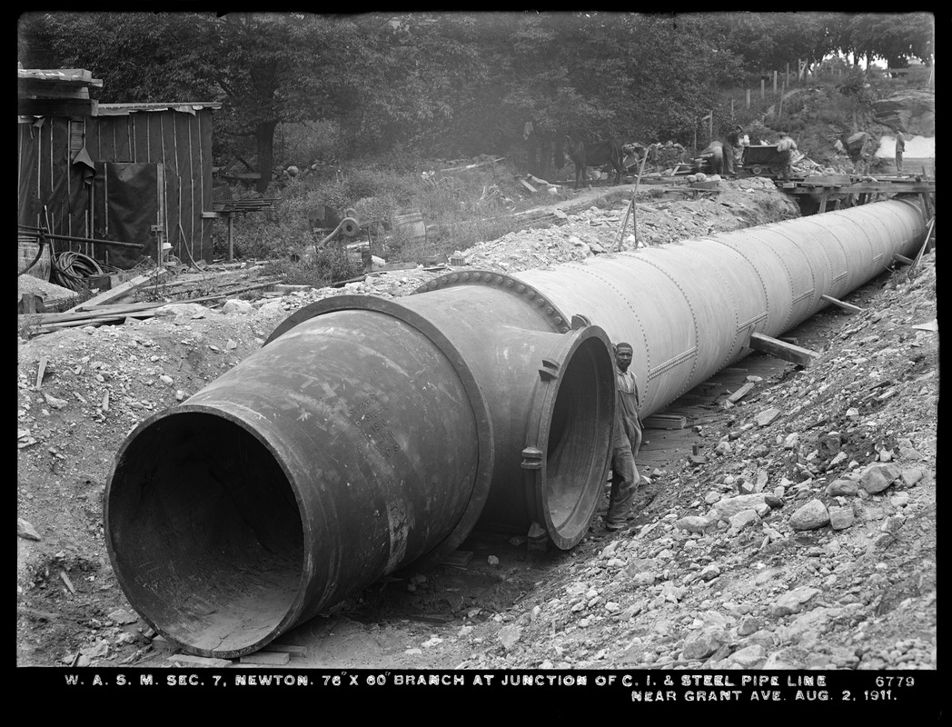 Distribution Department, Weston Aqueduct Supply Mains, Section 7, 76"x60" branch at junction of cast-iron and steel pipe line, near Grant Avenue, Newton, Mass., Aug. 2, 1911
