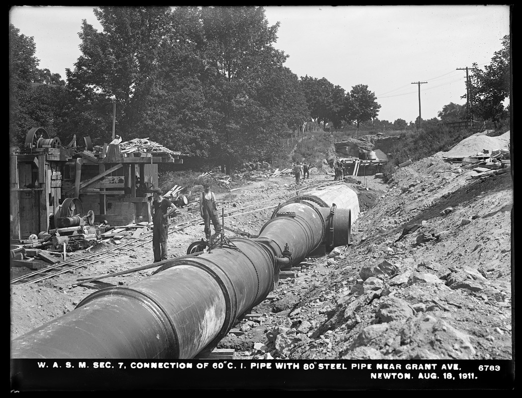 Distribution Department, Weston Aqueduct Supply Mains, Section 7, connection of 60-inch cast-iron pipe with 80-inch steel pipe near Grant Avenue, Newton, Mass., Aug. 18, 1911