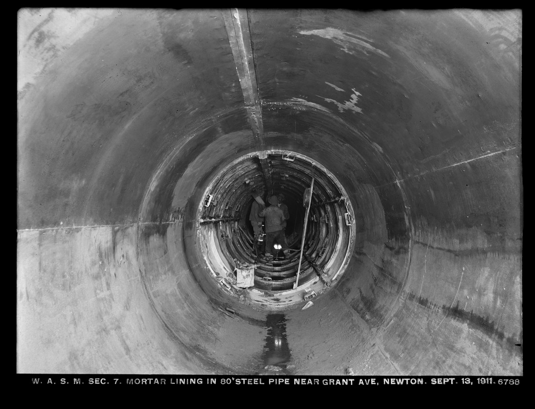 Distribution Department, Weston Aqueduct Supply Mains, Section 7, mortar lining in 80-inch steel pipe near Grant Avenue, Newton, Mass., Sep. 13, 1911