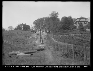 Distribution Department, Southern Extra High Service Pipe Lines, Section 41, laying 20-inch pipe, Mansur Street, West Roxbury, Mass., Oct. 9, 1911