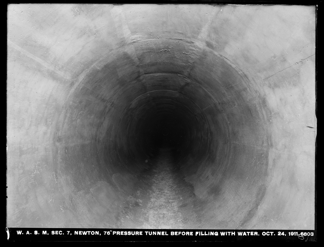 Distribution Department, Weston Aqueduct Supply Mains, Section 7, 76-inch pressure tunnel before filling with water, Newton, Mass., Oct. 24, 1911