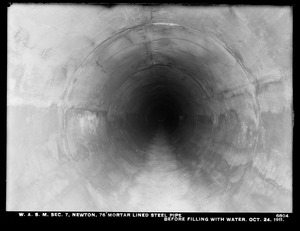 Distribution Department, Weston Aqueduct Supply Mains, Section 7, 76-inch mortar lined steel pipe before filling with water, Newton, Mass., Oct. 24, 1911