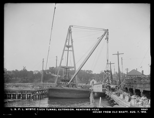 Distribution Department, Low Service Pipe Lines, Mystic River tunnel extension, removing headhouse from old shaft, Charlestown, Mass., Aug. 7, 1912