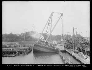 Distribution Department, Low Service Pipe Lines, Mystic River tunnel extension, attempt to lift old shaft out of river bed, Charlestown, Mass., Aug. 7, 1912