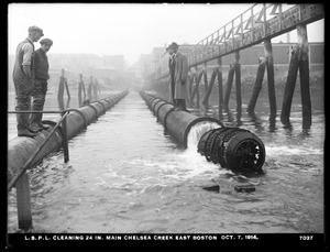 Distribution Department, Low Service Pipe Lines, cleaning 24-inch main, Chelsea Creek, East Boston, Mass., Oct. 7, 1914