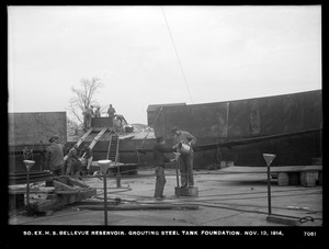 Distribution Department, Southern Extra High Service Bellevue Reservoir, grouting steel tank foundation, Bellevue Hill, West Roxbury, Mass., Nov. 13, 1914
