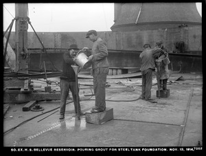 Distribution Department, Southern Extra High Service Bellevue Reservoir, pouring grout for steel tank foundation, Bellevue Hill, West Roxbury, Mass., Nov. 13, 1914