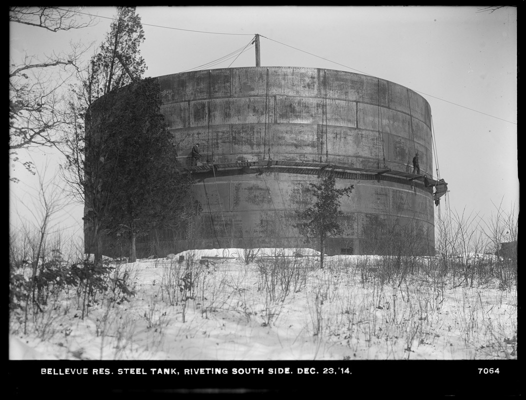 Distribution Department, Southern Extra High Service Bellevue Reservoir, riveting south side of steel tank, Bellevue Hill, West Roxbury, Mass., Dec. 23, 1914