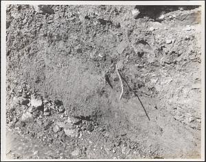 Pit shot showing sandy material