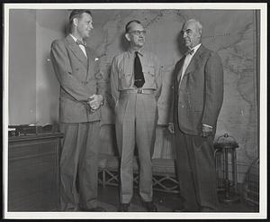 Pearl Harbor, T. H., March 20 – (Left to right) Ex-Governor Maurice J. Tobin, of Boston, Mass., Admiral Louis E. Denfeld, USN., of Westboro, Mass., and Doctor Ernest M. Hopkins, President Emeritus of Dartmouth College, Hanover, New Hampshire, meet at Headquarters of Admiral Denfeld, Commander-in-Chief of the Pacific and U.S. Pacific Fleet. Doctor Hopkins is Chairman of a committee recently appointed by Secretary of the Navy, James V. Forrestal, to study Naval Civil Government of Guam and Samoa, Governor Tobin being a member of that committee.