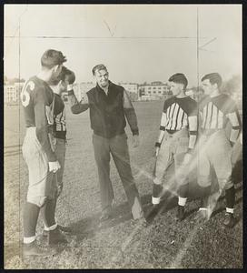 No 2 photo - Blondy Ryan shows em how to throw em. Left to right- Bart Whelan, Bennie Collier, Ryan, Johnny Mc Wilbur Murphy.