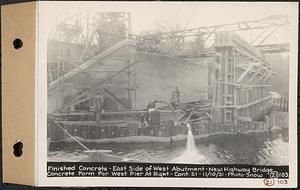 Contract No. 21, Portion of Ware-Belchertown Highway, Ware and Belchertown, finished concrete, east side of west abutment, new highway bridge, concrete form for west pier at right, Ware and Belchertown, Mass., Nov. 10, 1931