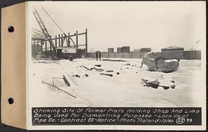 Contract No. 85, Manufacture and Delivery of Precast Concrete Steel Cylinder Pipe, Southborough, Framingham, Wayland, Natick, Weston, showing site of former plate welding shop and Lima being used for dismantling purposes, Natick, Mass., Jan. 3, 1940