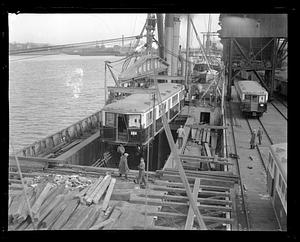 Railroad car being hoisted