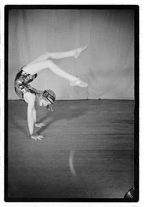 Girl acrobat in costume
