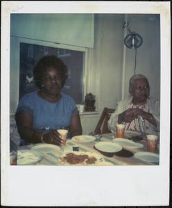 Two people sitting at a table