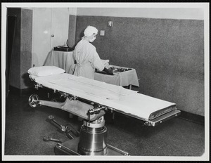 Preparing a bed at Faulkner Hospital