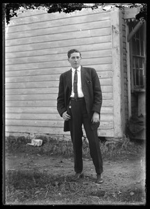 Young man standing outdoors