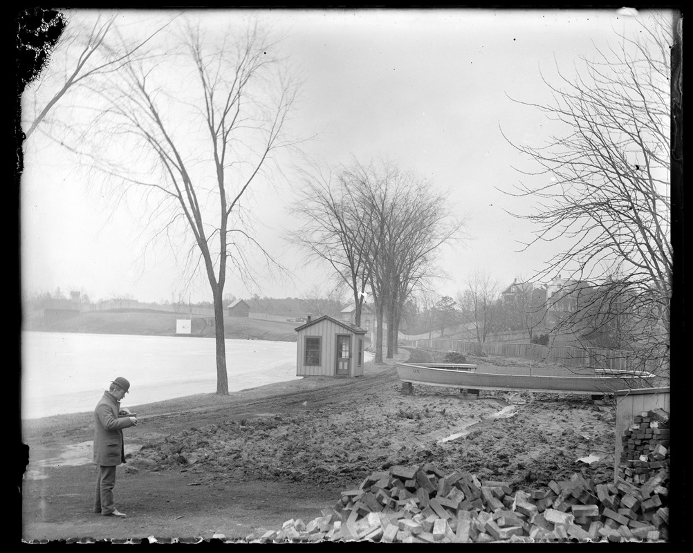 Man (photographing?) Watershops Pond, Springfield