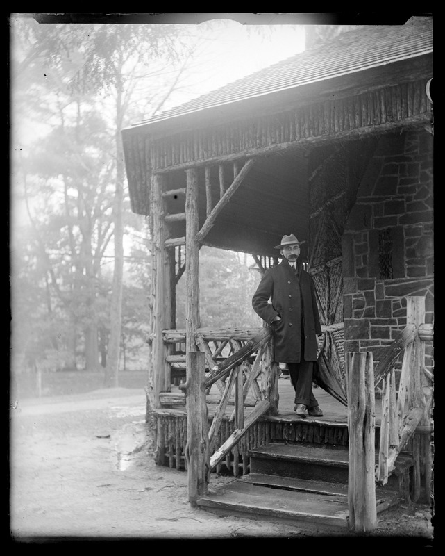 Augustus Martin on porch of rustic pavilion at Forest Park Springfield