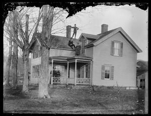House exterior with figures from porch to roof