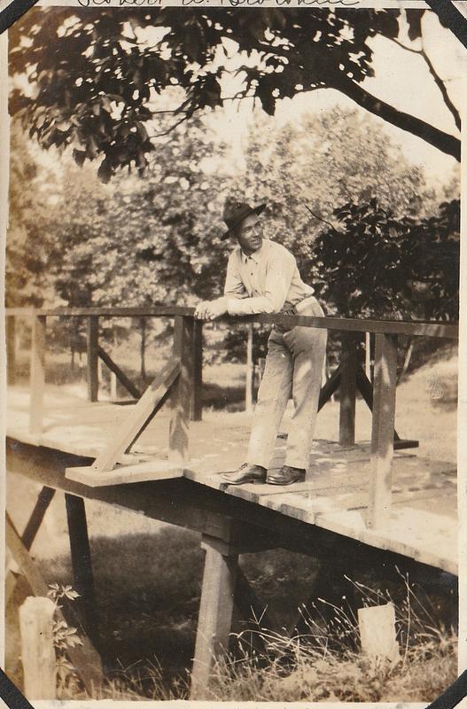 Robert W. Brownlee on wooden bridge, Marine base Quantico, VA Digital