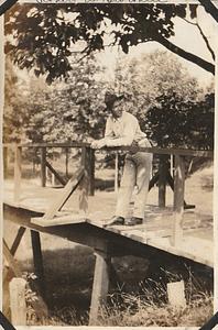 Robert W. Brownlee on wooden bridge, Marine base Quantico, VA