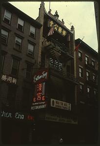 Building on Pell Street with signs for Chinese temple and restaurant, Manhattan, New York