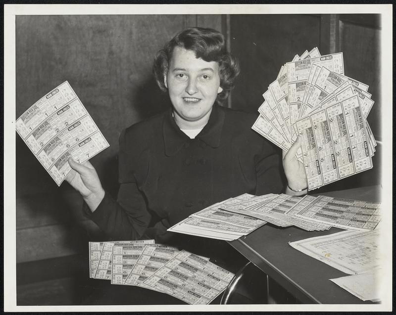 Red Sox World Series Tickets Arrive. Miss Rose Sellon, Boston Red Sox employe, holds World Series Tickets which arrived from Philadelphia at Fenway Park tonight (Sept. 28), in event the Boston Red Sox should win the American League pennant.