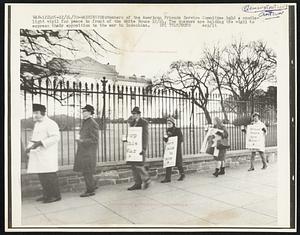 Members of the American Friends Service Committee held a candlelight vigil for peace in front of the White House 12/24. The Quakers are holding the vigil to express their opposition to the war in Indochina.