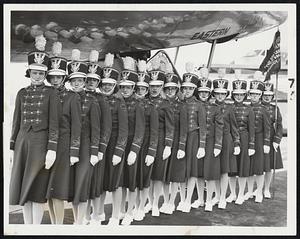 Off for New York on an Eastern Air Lines plane, to march in today's American Legion parade hthere, are members of the drill team of St. John's Church, Quincy. Left to right: Joan MacDonald, Phyllis Saari, Alice Conniff, Betty Picard, Priscilla Mattson, Patricia Hedwig, Carlo Cambria, Jena Pascale, Rose DiGiusto, Connie Mariani, Edna Decelle, Toni DiStefano, Anne Mina, Carol Sullivan and Marry Horrigan.