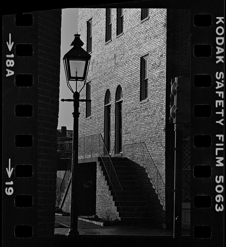 Lamppost and brick building