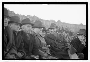 Boston Parks Department Commissioner William Long watching a football game, Back Bay Fens